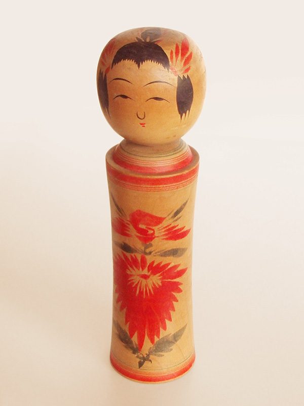 赤い花模様のこけし